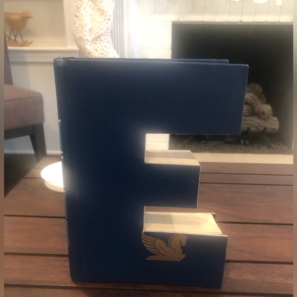 Anthropologie: Hand cut letters from Reader’s Digest books. Spells out “HOME.” - Picture 13 of 15